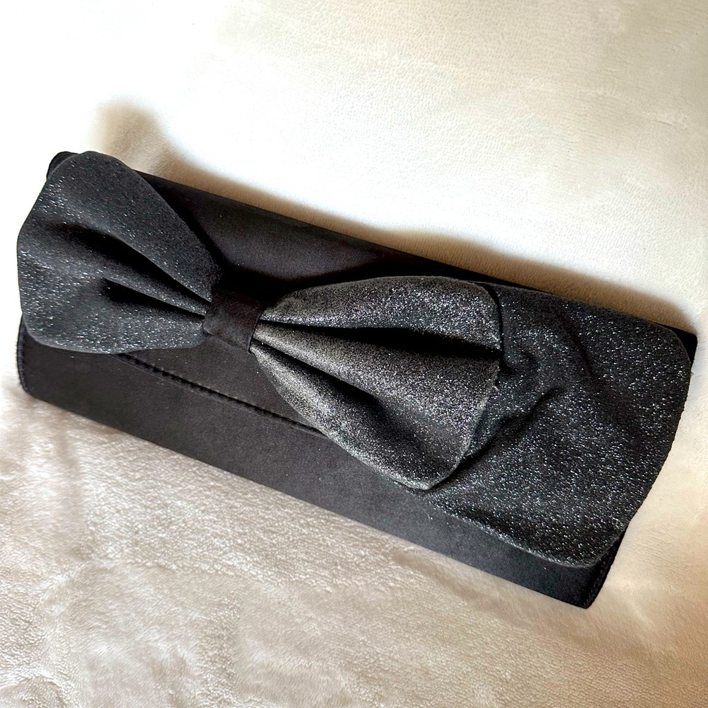 Black satin formal evening clutch purse with glitter bow detail